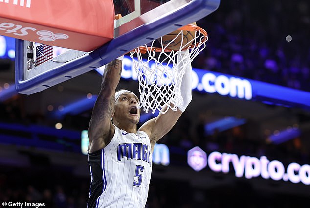 Paolo Banchero #5 dunks during the fourth quarter against the Philadelphia 76ers