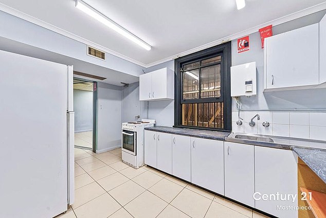 The entire property has tile floors, but it feels more like an office space with a rickety kitchen than a family home.