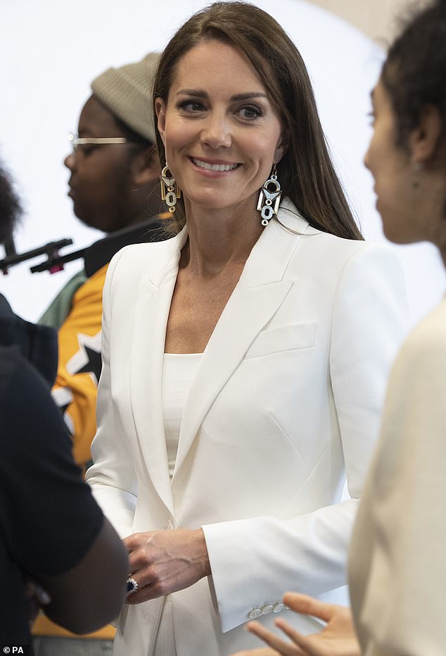 Dazzling Duchess!  Kate donned a spectacular pair of drop earrings when she visited ELEVATE with Prince William