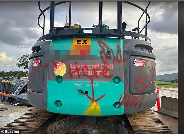 The pair are alleged to have spray-painted 'f**k me here' on the side of the excavator owned by Advanced Civil Earthworks, as well as smashing its windows in