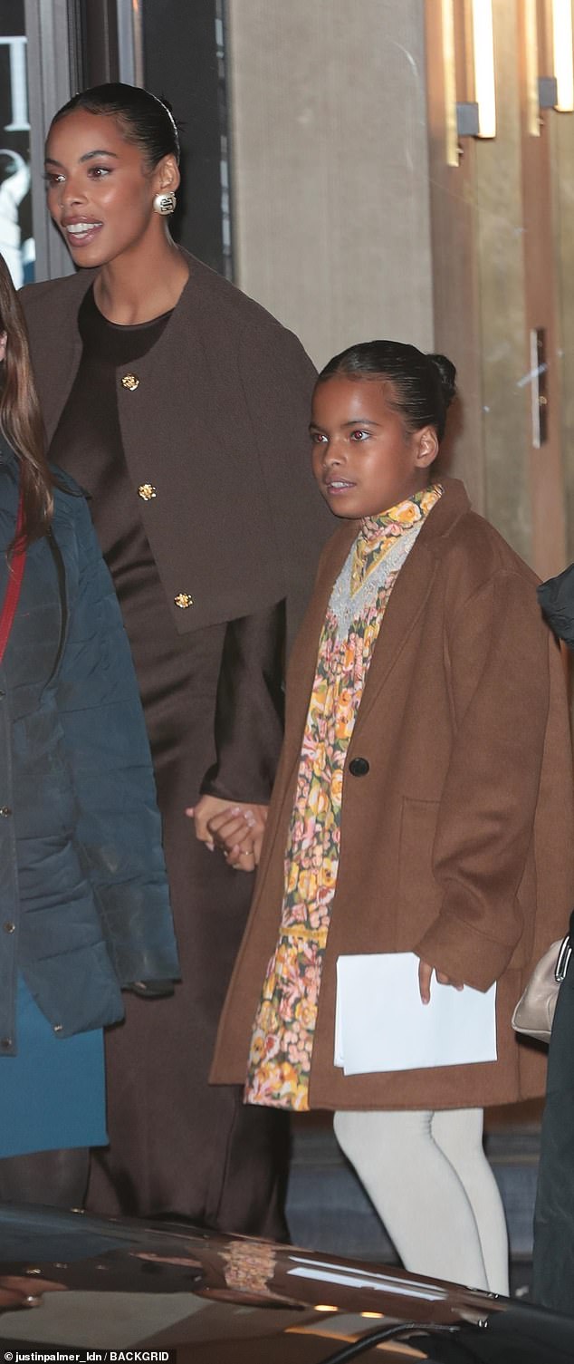 Mother-Daughter Outing: Rochelle, meanwhile, was always the radiant beauty in a chocolate satin maxi dress