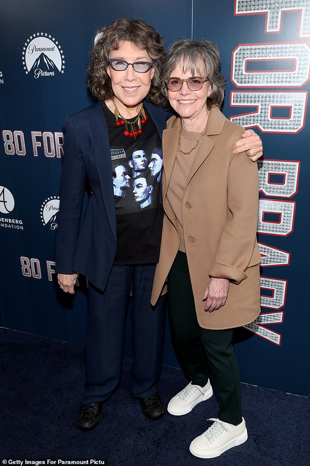 Classy: Field, 76, was dapper as always in a tan coat over a cozy tan sweater  The Mrs. Doubtfire star paired the look with black pants and white sneakers.