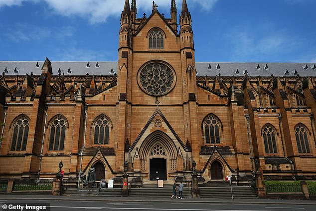 NSW Police are trying to stop LGBTQI protests from taking place outside Cardinal Pell's funeral at St Mary's Cathedral (pictured) in Sydney