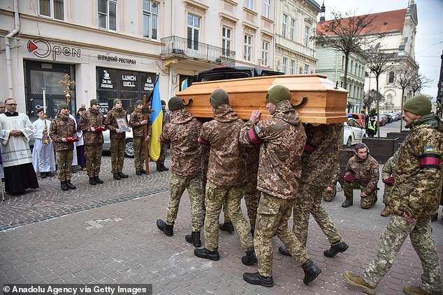 In the photo: Ukrainian soldiers carry a coffin during the funeral ceremony of Vitaly Svintsitskyi in the Latin Cathedral in Lviv, on January 30, 2023. Svintsitskyi was a deputy of the Lviv City Council, who from the first days of the war joined the the ranks of the 80. brigade
