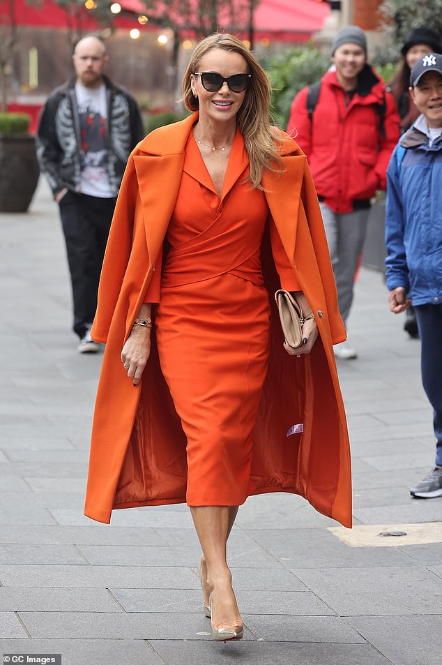 Turning heads!  The Britain's Got Talent judge added height to her frame with a pair of towering gold Christian Louboutin heels.