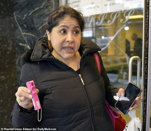 Erika Quintero, a single mother who lives across the street from the camp with her young son, told DailyMail.com she was forced to carry pepper spray just to get through the noisy crowd to her building, showing the canister as evidence. .