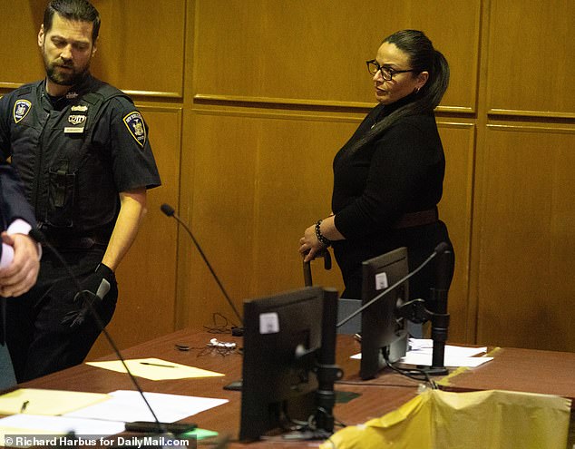 Nasyrova appeared in a black high-necked top, glasses and her hair in a ponytail during the court appearance.