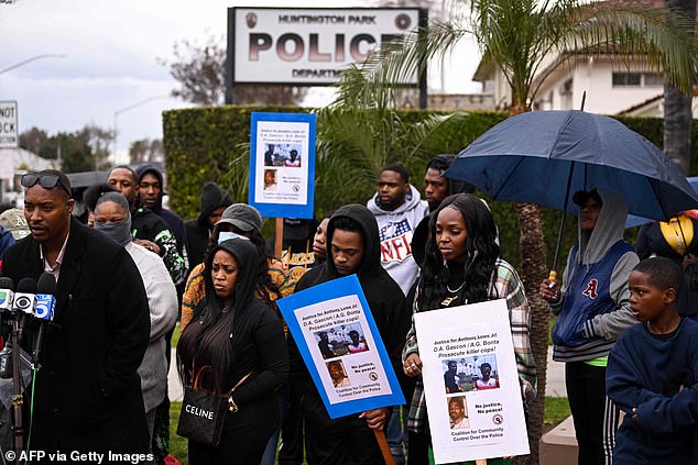 Family and friends of Anthony Lowe Jr hold a press conference to demand an investigation into his death outside the Huntington Park Police Department in Huntington Park, California.