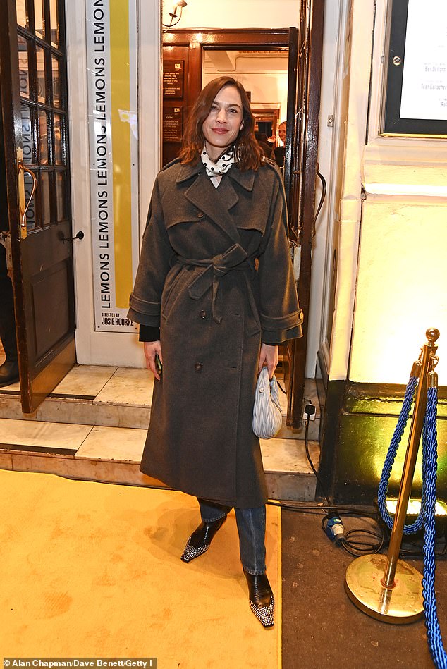 All Stars: Elsewhere, Alexa Chung looked chic in a long gray winter coat that she tied at the waist