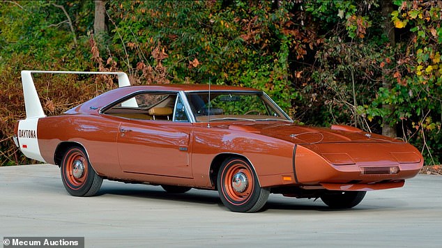 The 1969 Dodge Hemi Daytona sold for a record $1.43 million at the Mecum Auctions event in Kissimmee, Florida