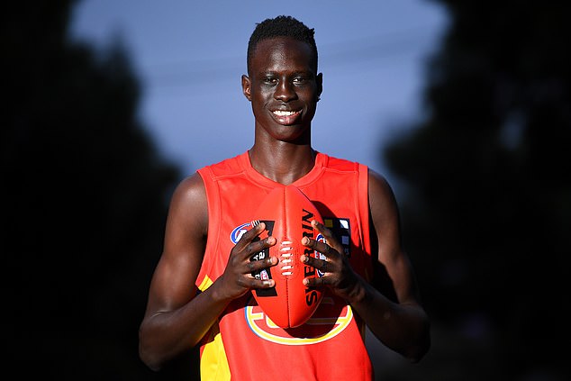 Gold Coast youngster Mac Andrew (pictured) will miss the first two games of the AFL season after being charged with drink driving late last month.