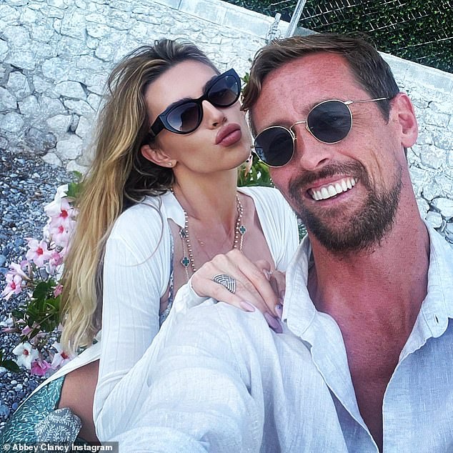 Wedding bells: Abbey Clancy and Peter Crouch renewed their wedding vows in a 'beautiful' ceremony on the beach in the Maldives