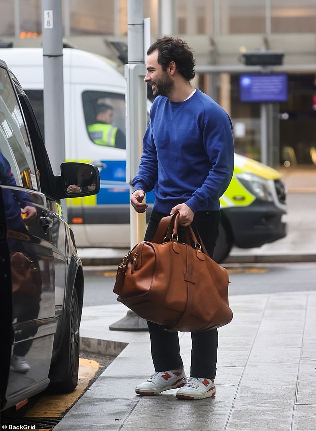 Emerging: Aidan Turner has been pictured with his wedding ring firmly on, following speculation that his marriage to Caitlin Fitzgerald may be on the rocks.