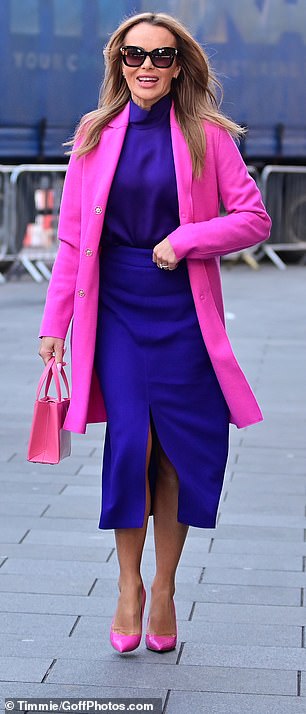 Bold and bright: Amanda Holden returned to her best color in a purple skirt and blouse and a contrasting pink coat as she left Heart FM radio studios in London on Wednesday