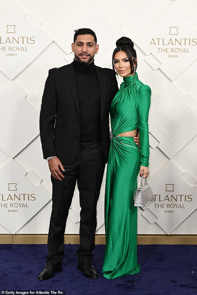 Dresses: Amir Khan and his wife Faryal Makhdoom posed up a storm on Saturday as the couple attended the opening of Dubai's new luxury hotel, Atlantis The Royal.