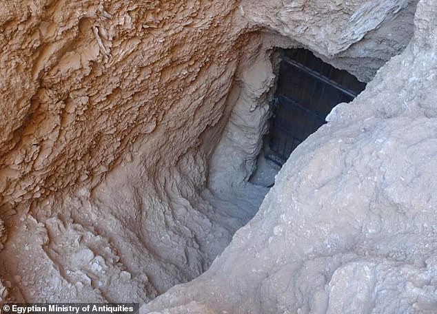 Photo released by the Egyptian Ministry of Antiquities shows a view of the entrance of the newly-discovered tomb in Egypt's southern province of Luxor