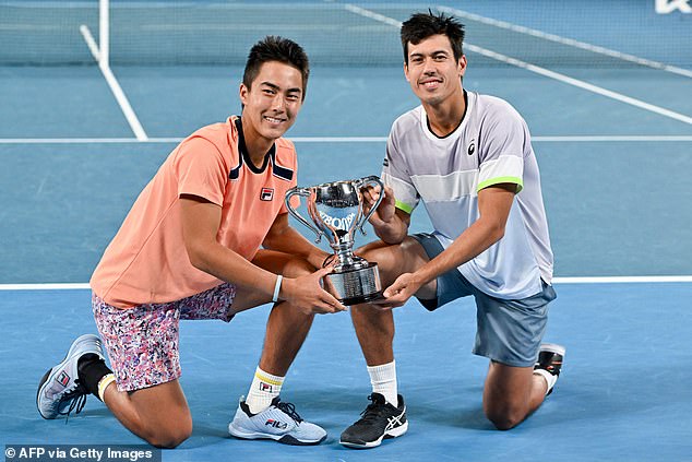 Rinky Hijikata (left) and Jason Kubler (right) won the Australian Open doubles on Saturday.