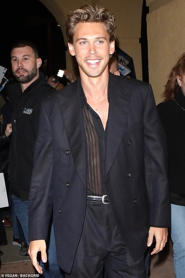 Looking good: Austin Butler cemented his heartthrob status Sunday while attending a Hollywood screening of his movie Elvis