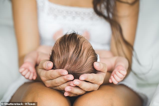 The Northern Ireland Police Service has expanded its search for women and children affected by institutional abuse between 1922 and 1990 to Australia (archive image of a mother holding her baby)