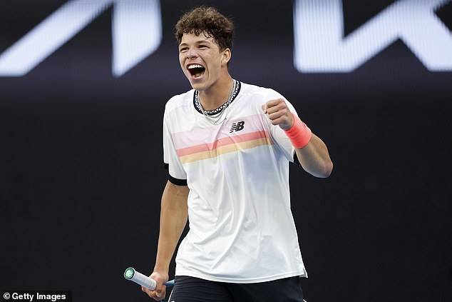 Ben Shelton celebrates after winning a five-set thriller against fellow American JJ Wolf