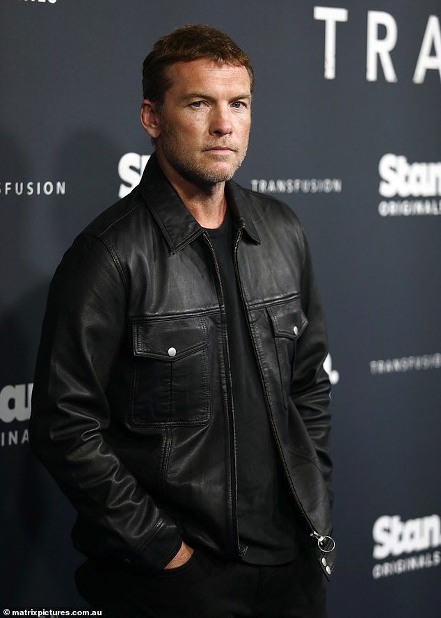 Sam Worthington was all smiles on the red carpet when he attended the premiere of his new original Stan movie, Transfusion, on Thursday night.