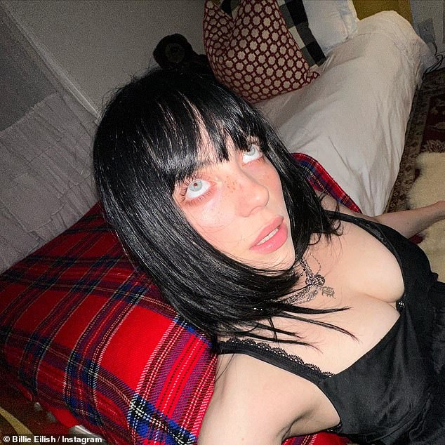 Bedroom shoot: Billie Eilish shared a series of racy snaps on her social media Tuesday night