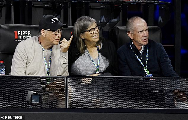 Billionaire Bill Gates sat courtside at the Australian Open as he watched the women's semifinals with his sister Kristianne on Thursday night.