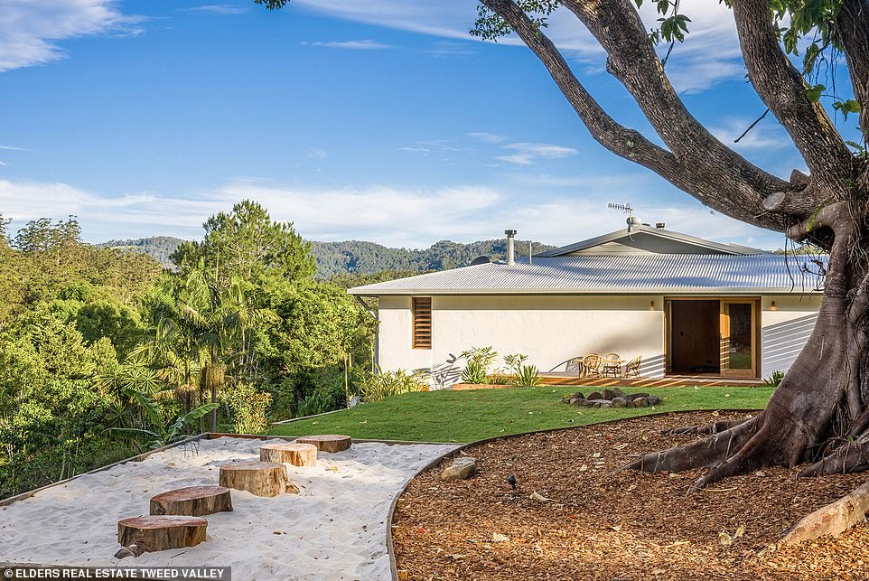 Behind a plain façade lies an incredibly dreamy home that makes for the ultimate country getaway.  The luxurious sanctuary has two pools, an open and airy family room, a separate guest house, and a luxurious master suite.