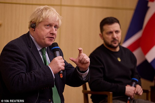 Former British Prime Minister Boris Johnson and Ukraine's President Volodymyr Zelensky address students at Taras Shevchenko State University, amid Russia's attack on Ukraine, in Kyiv, Ukraine, January 22, 2023. .