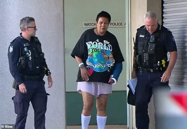 Brisbane Broncos player Payne Haas's mother, Uiatu 'Joan' Taufua, was escorted by police to the Southport guardhouse on Tuesday afternoon (Pictured Taufua outside the guardhouse)