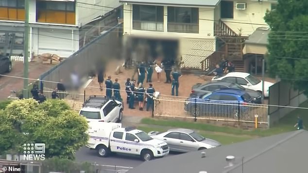 Police were forced to storm a bathroom to end a four and a half hour siege in Brisbane on Friday.