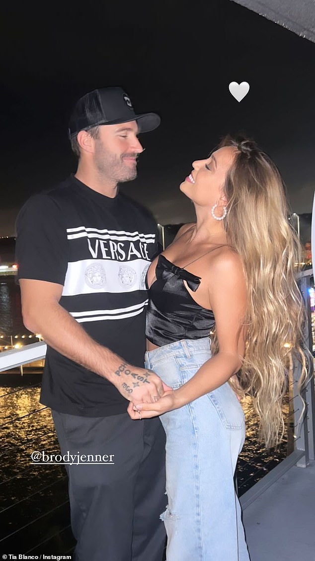 The Latest: Brody Jenner, 39, and his girlfriend Tia Blanco, 25, revealed they are expecting a child together on Sunday.  They were photographed ringing in the new year.