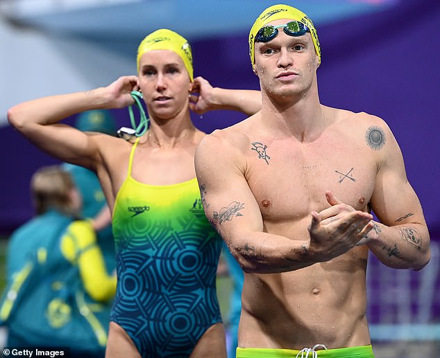 Pop star-turned-competitive swimmer Cody Simpson (right with girlfriend Emma McKeon) has admitted he's still dealing with the trauma of years spent in America trying to make it as a musician.