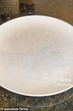 BEFORE: The woman's white plates appeared to be covered in scratches, but she found the marks weren't permanent