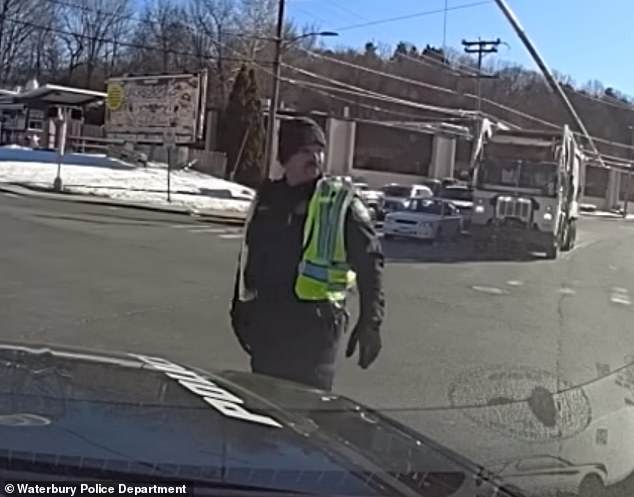 James Hinkle was fired from the Waterbury Police Department after he was filmed berating a woman in an SUV that passed him while directing traffic.