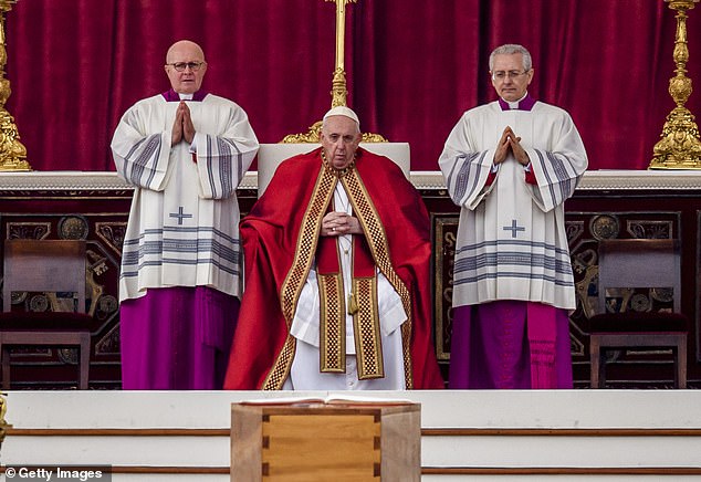 Pope Francis (centre), 86, pictured presiding over the funeral of his predecessor Pope Benedict XVI last week, is facing a revolt among conservative cardinals