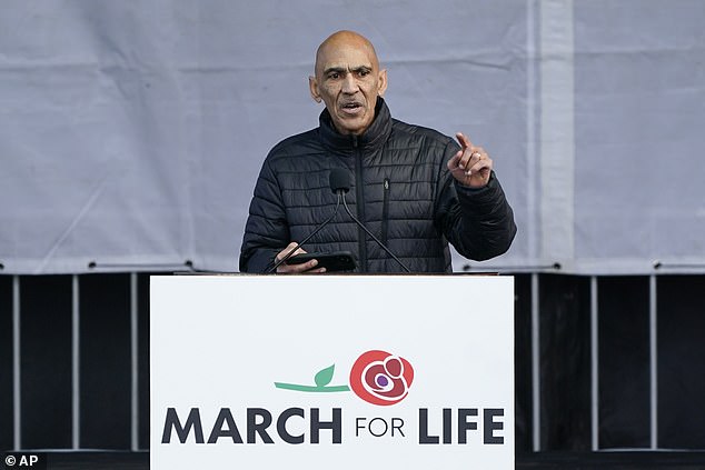 Tony Dungy, pictured at a rally in Washington on Friday, has apologized for a controversial tweet.