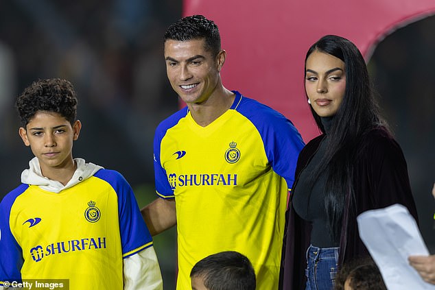 Cristiano Ronaldo accompanied by his partner Georgina Rodriguez and his son Cristiano Ronaldo Jr, greet the crowd during the official unveiling of Cristiano Ronaldo as an Al Nassr player at Mrsool Park Stadium on January 3, 2023 in Riyadh, Saudi Arabia