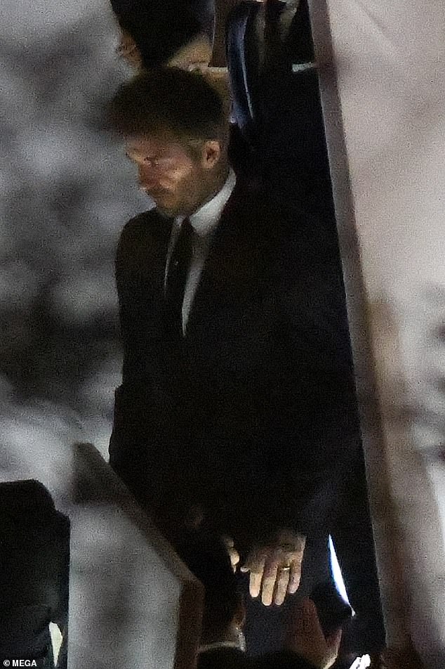 Guest: David Beckham showed off a sleek figure in a black suit on Saturday while attending the wedding of his friend Marc Anthony and Nadia Ferreira.