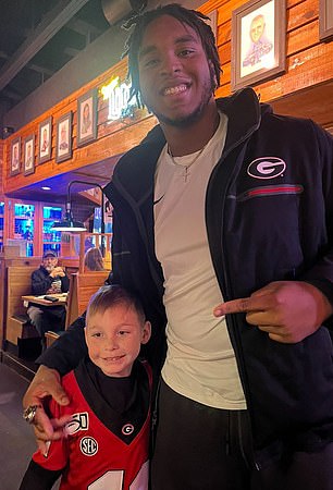 Willock bumped into a longtime fan and his little grandson after the Bulldogs' victory parade.