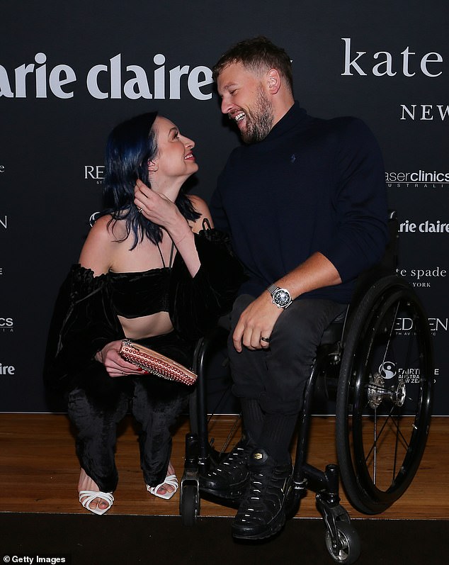 Wedding bells are ringing for Australian of the year Dylan Alcott, 32, and his girlfriend, sexologist Chantelle Otten, 31, reports say.  The couple is shown in March 2022.