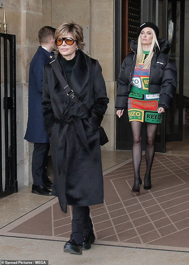 Bonjour!  Lisa Rinna and her former Real Housewives of Beverly Hills co-star Erika Jayne were seen exploring the City of Lights on Friday afternoon during Paris Fashion Week.