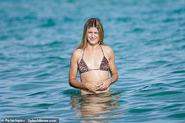 Bouchard enjoys the warm winter sun on a Miami beach after missing out on qualifying for the Australian Open in Melbourne.