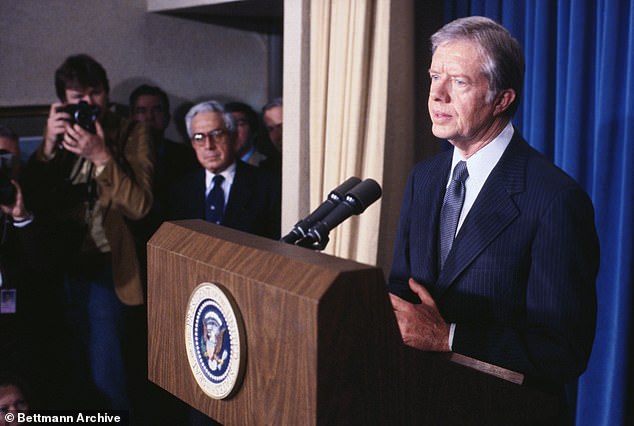 President Jimmy Carter is seen on his last day in office, a turbulent period marked by negotiations to resolve the Iran hostage crisis