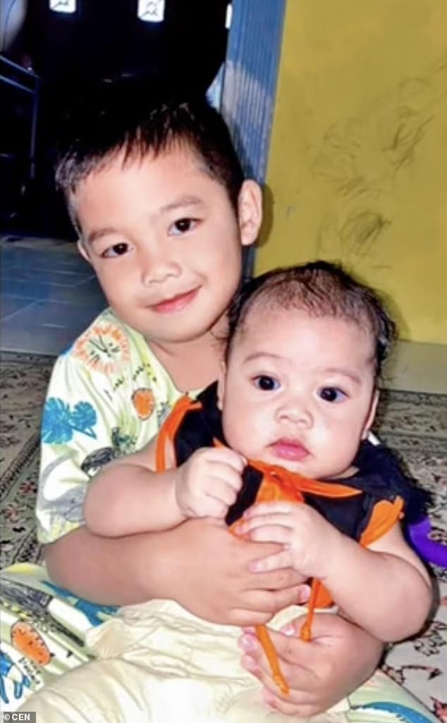 The boy, known locally as Muhammad Ziyad Wijaya (left), had disappeared two days earlier near the Jawa estuary in East Kalimantan province.