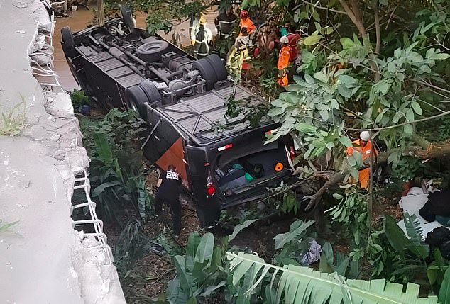 Four people were killed and 29 injured when a bus carrying a youth soccer team fell off a bridge into a stream and overturned.