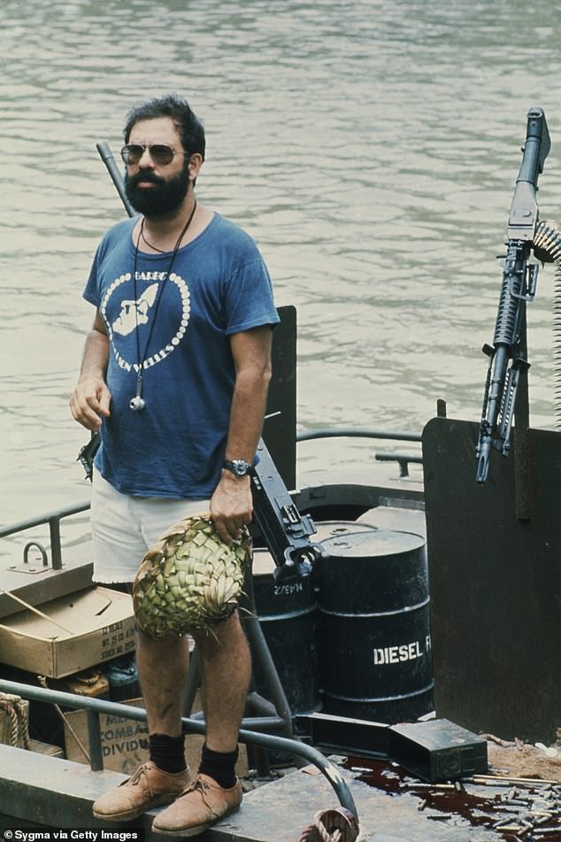 Coppola is no stranger to a chaotic scenario, as he runs into trouble while filming his seminal masterpiece Apocalypse Now.  The director is seen here during the filming of the seminal war film in the Philippines over 50 years ago in 1976.