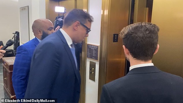 Reporters saw him briefly enter and then leave his office Thursday morning.