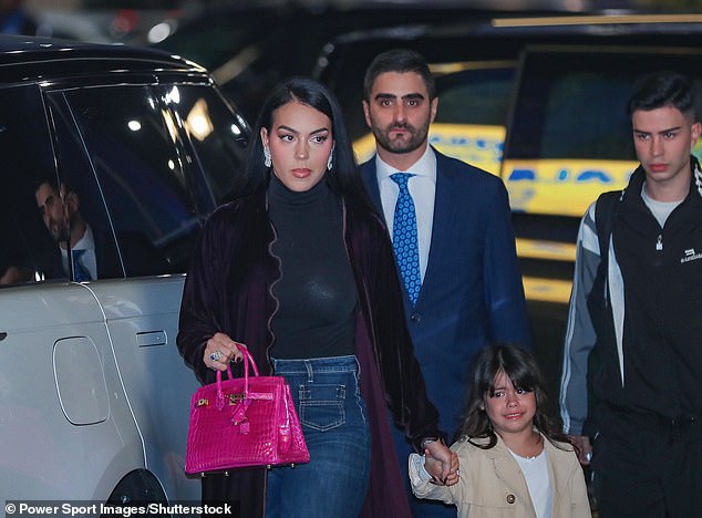 Wow: Georgina Rodríguez wore a sparkling diamond ring as she attended her partner Cristiano Ronaldo's unveiling as the new Al-Nassr FC player in Riyadh on Tuesday.