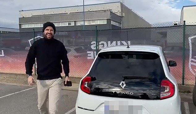 Fun ride: The footballer later hit back at his ex's diss job, which focused on his new romance, by showing up at work in a Renault Twingo car